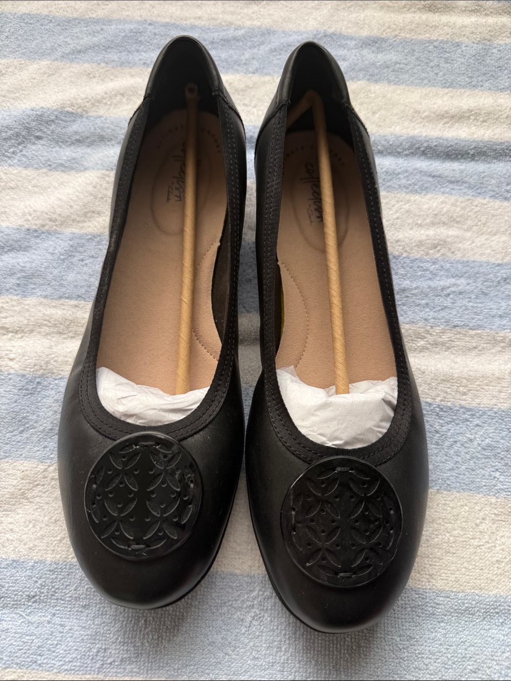 Clarks Black Leather Slip-On Ballet Flats with Decorative Medallion